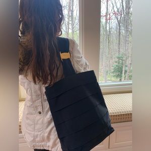 Authentic Salvatore FERRAGAMO vintage one strap backpack in Navy.